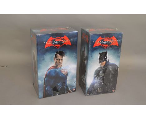 2 Batman v Supeman boxed exclusive figures and Blu-ray sets, one set has the Superman figure and the other has the Batman fig