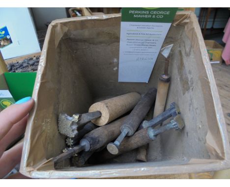 A box of 9 finishing tools