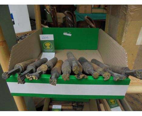 A bundle of 12 decorative centre and corner tools