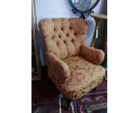 A pair of 20th century mahogany tub chairs, with button back floral upholstery (2) 