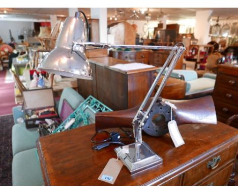 A contemporary chrome anglepoise lamp, on stepped square base 