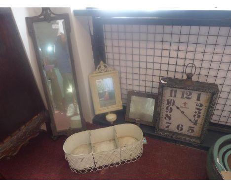 Three metal garden mirrors, together with a rectangular clock with Arabic dial marked London, 43 x 33cm, and a metal three se