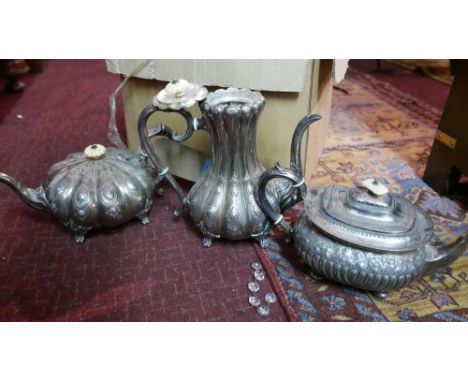 A collection of silver plated ware, to include 2 teapots, a hot water pot, twin handled sucrier, milk jugs and a pewter hip f