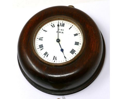 A GWR oak cased 'pork pie' signal box clock, 3.5" white enamel dial with Roman numerals, blued steel spade hands, dial and br