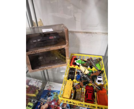 Small lot of die cast models together with 2 boxed army models. 