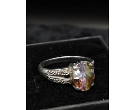 Silver ring set with stones. 