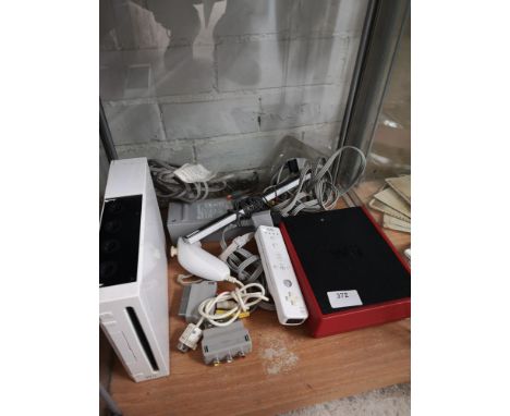 Nintendo wii console with accessories. 