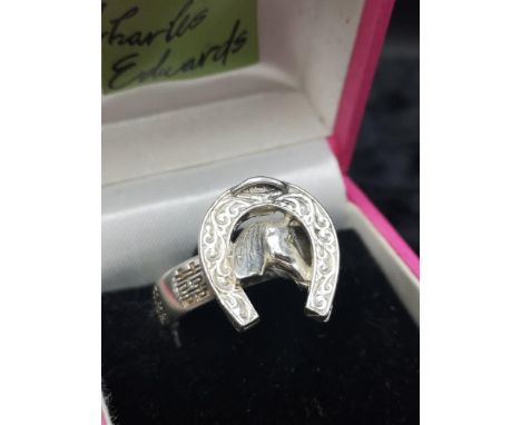 Heavy silver 925 horse shoe ring with horse head. 