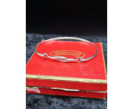 Silver bangle set with stone. 