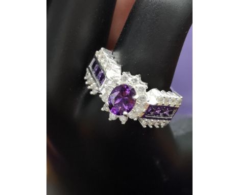 Silver 925 Bling Ring set With purple &amp; white stones. 