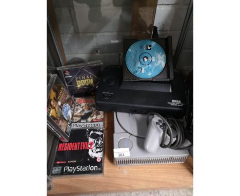 Playstation one console with games together with Sega master system. Not tested Sega. 