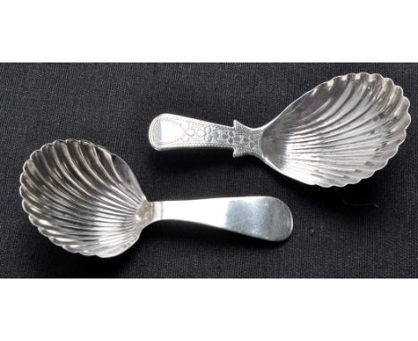 A George III caddy spoon, by John Lawrence, Birmingham 1814, shell bowl, engraved handle; and a George III caddy spoon, by Wi