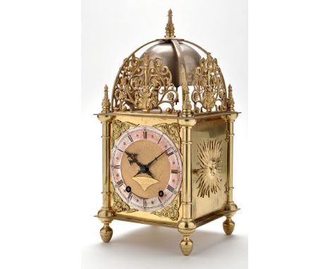 A 17th Century style brass lantern clock, with silvered roman chapter ring, matted centre with nameplate signed 'Edward Johns