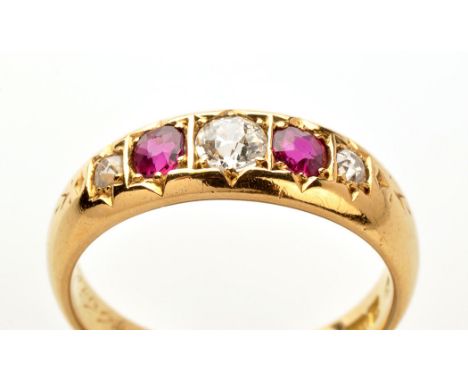 A diamond and ruby ring, the three graduated old cut diamonds flanked by two circular mixed cut rubies, in star cut mounts, o