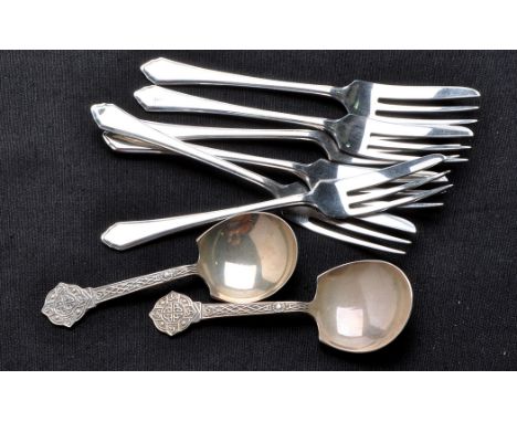 A pair of Elizabeth II caddy spoons, by Cooper Bros., Sheffield 1975, Celtic pattern; and six George VI pastry forks, by Mapp