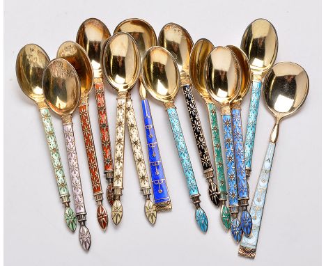 A set of twelve Norwegian silver and varicoloured enamel coffee spoons, stamped 'Sterling J. Tostrup, Norway'; and two Norweg