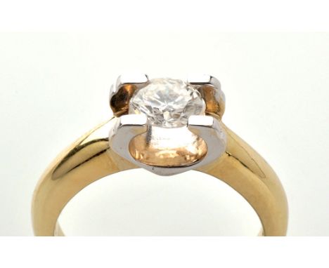 A single stone diamond ring, the brilliant cut diamond weighing approximately 0.80 carats, in white metal suspended setting, 