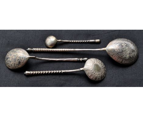 Four 875 standard Russian silver spoons, to include: a spoon with twisted stem, Moscow 1887, 8in. (20cms); another, Masters m