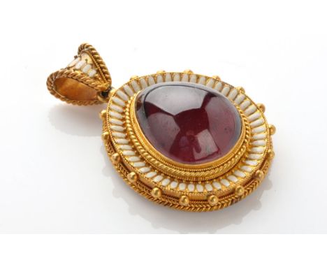 A 19th Century renaissance revival pendant, with pear-shaped red glass cabochon collet set to centre within a ropework bezel,