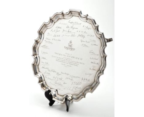 A George V presentation salver, by Cooper Bros. & Sons Ltd., Sheffield 1927, shaped circular, centred by a Royal Artillery in