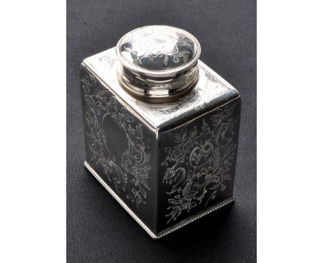 A George III tea caddy, by W.S., London 1781, rectangular, engraved foliated scrolls around cartouche, detachable cover, 4 1/