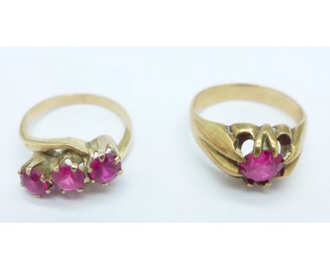 Two 9ct gold and red stone rings, 8.9g, O and R