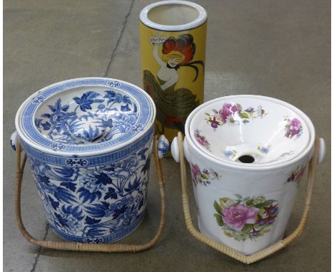 Two slop buckets, one floral, one blue and white, a/f and a stick stand with French transfer printed decoration 'Le Frou-Frou