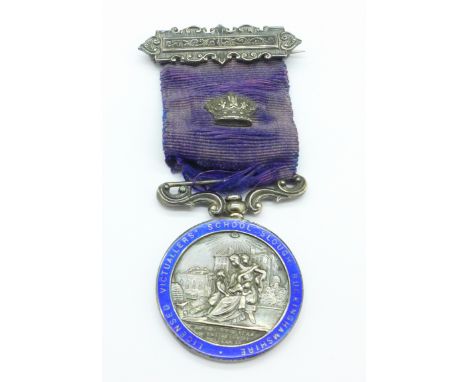 A silver and enamel 1935 commemorative medallion