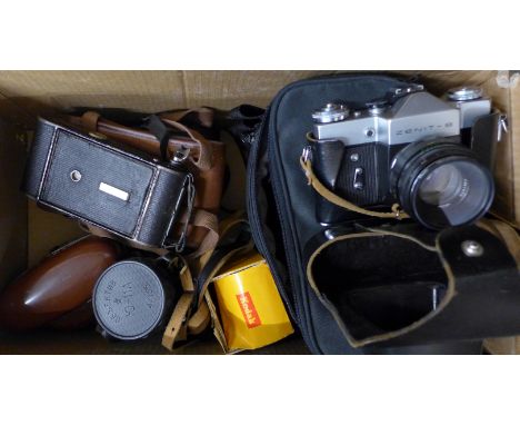 Cameras including Zenit-B, a folding camera, Kodak and Canon cameras, Russian lens, etc.