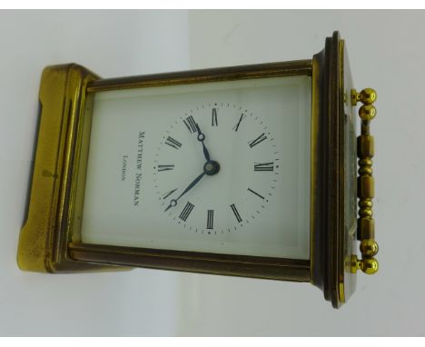 A Matthew Norman brass cased carriage clock