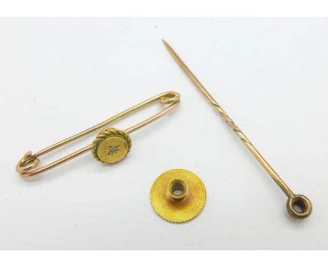 A yellow metal, diamond set brooch with stick pin conversion, in fitted case, the fastening 'screw' marked 15ct, 3.5g