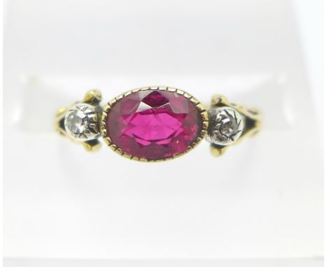 A yellow metal, ruby and diamond ring, 2.3g, M