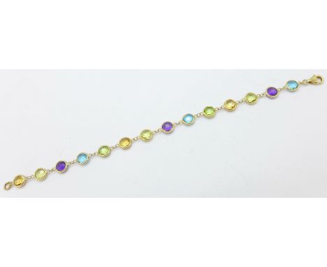 A 14k gold, amethyst, peridot, topaz and citrine bracelet, 4.1g