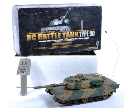 An original Heng Long 1/24 scale RC Radio Control model Battle Tank. The model with motor air gun and long firing distance, 2