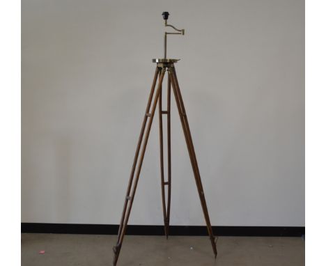 A wooden and brass theodolite stand, height 155cm IMPORTANT! REGARDING CONDITION REPORTS: Please note this is an auction with