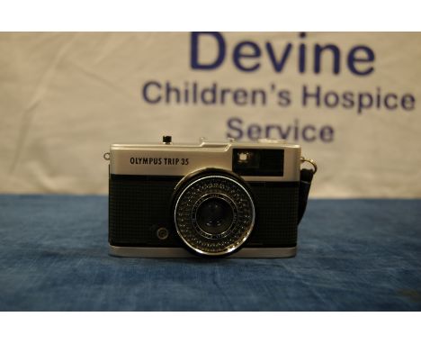 An Olympus Trip 35, shutter working, light cell responsive, bodt good  IMPORTANT! REGARDING CONDITION REPORTS: Please note th