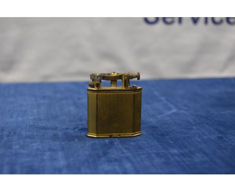 A Dunhill gold plated lighter, with engine turned decoration IMPORTANT! REGARDING CONDITION REPORTS: Please note this is an a