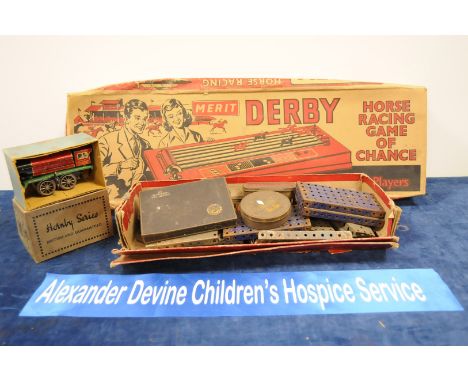 A Hornby clockwork MO 0-4-0 tank locomotive in box, together a Merit Derby game and several items of Meccano, and a Corintheu