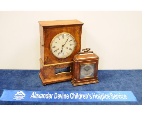 A walnut first half 20th Cenutry wind up mantel clock, of architectural form with carry handle, 24cm max, together with a Vic