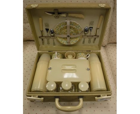 A mid 20th Century Brexton picnic hamper, fully fitted with floral decorated china, flasks, cutlery, etc