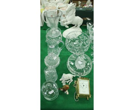 A quantity of various cut glassware to include jars and covers, vase, bowls, jug etc., a Gien pottery figure of a rearing hor