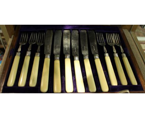 A set of nine Victorian silver bladed ivory handled fish knives and forks (by Harrison Brothers &amp; Howson Sheffield 1875) 