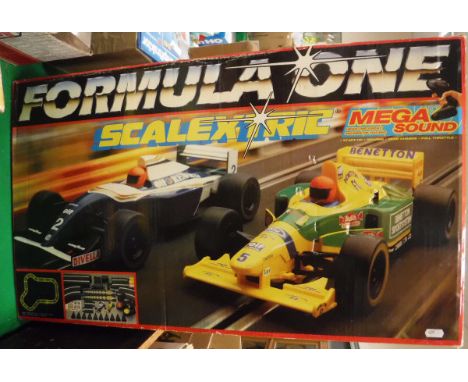 A Scalextric Formula One racing set, boxed, together with a Hump-back bridge, boxed, Porsche 911GTi, in perspex case and Mont