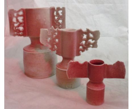 A matched graduated set of winged porcelain vases in a dappled pink ground by Colin Pearson CONDITION REPORTS All pieces have