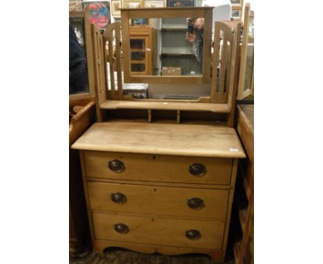 A circa 1900 pine dressing chest with mirrored superstructure above three long drawers to bracket feet