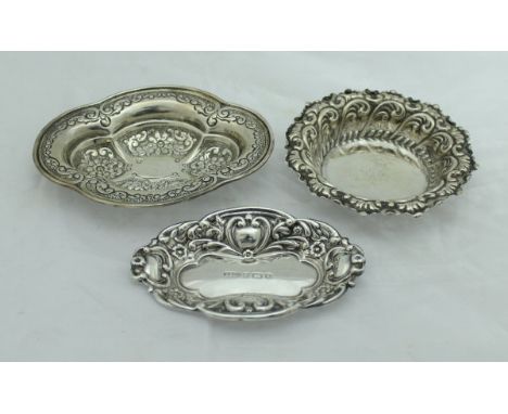 A Victorian silver shaped oval and embossed trinket dish London 1886 by Edgar Finley and Hugh Taylor for Horace Woodward &amp