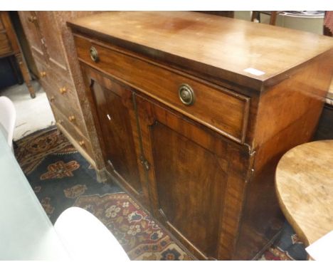 A 19th Century mahogany side cabinet with single drawer over two cupboard doors to splayed bracket feet