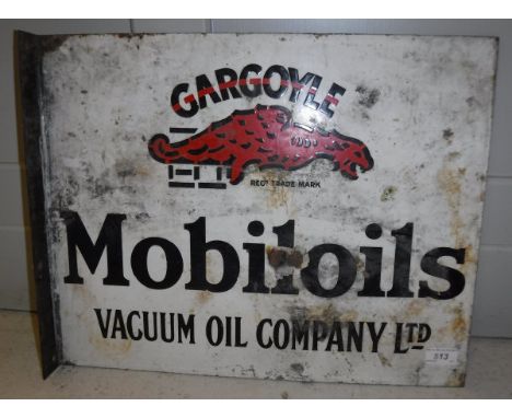 A vintage enamel sign "Gargoyle Mobil Oils Vaccum Oil Company Ltd."