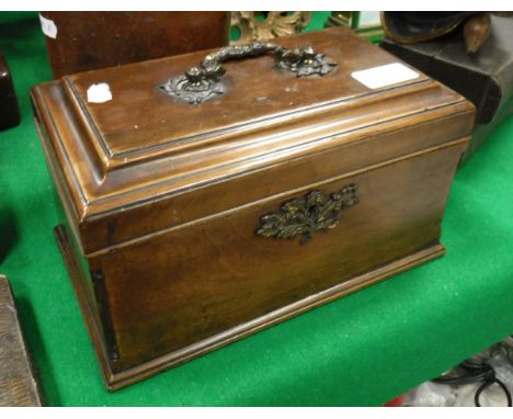A George III mahogany tea caddy with quarter cut column corners