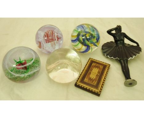 Three Caithness crystal paperweights, another cut glass paperweight by P.J. Ellison, an Art Deco painted and chrome plated fi